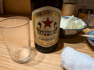 とりかわ長政 博多店 瓶ビールとお通しのキャベツ
